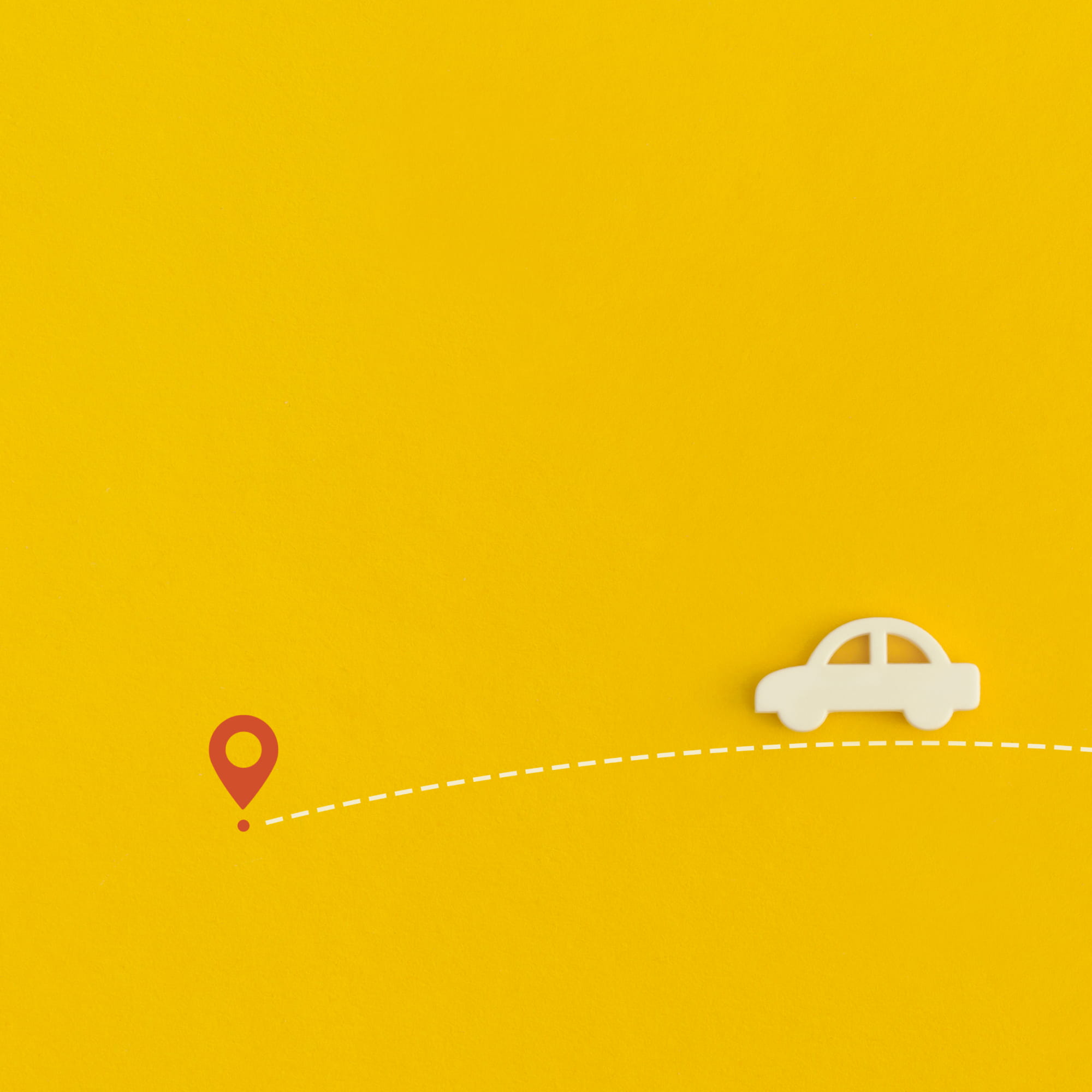 Icono de coche avanzando hacia un destino, representando el abono de transporte para mayores.