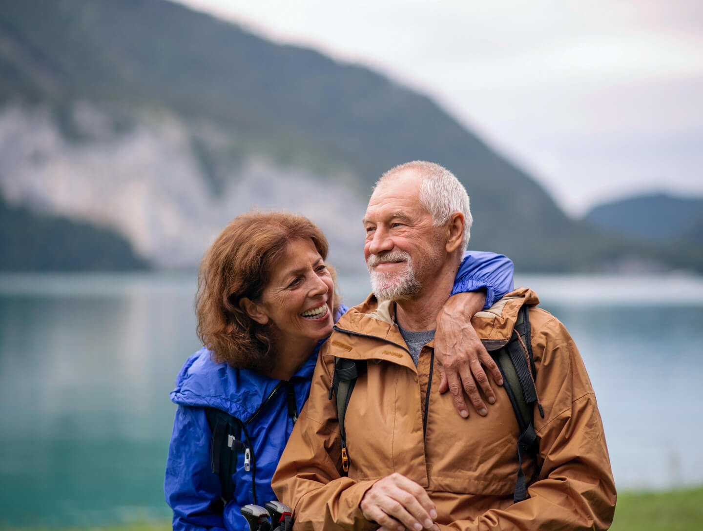 Happy seniors outdoors, related to preferential pension plans.